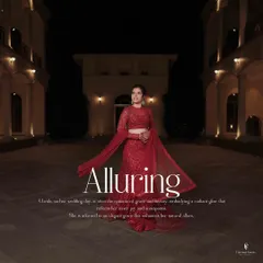 A bride, radiant in her red reception gown, stands as a symbol of grace and anticipation. My goal with cinematic portraits like this is to create a timeless image that feels like a still from a beautiful film.