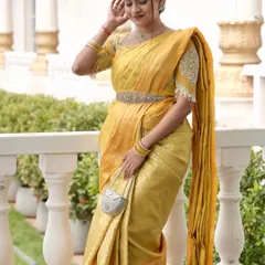 A full-length view of my traditional look. The intricate blouse, the elegant belt, and the beautiful silk saree all came together for a classic and graceful event outfit.