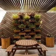 We also design and build complete outdoor environments, like this sustainable co-working space. The use of bamboo and natural wood creates a calming and productive atmosphere with minimal environmental impact.