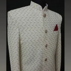 Another beautiful off-white sherwani fabric option with a subtle geometric pattern. I can source a wide variety of premium materials for your wedding outfit.