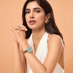 When styling Bhumi Pednekar for Versace watches, the focus was on sophisticated luxury. I paired a simple white halter top with statement vintage Versace earrings to draw attention to the elegant timepiece, creating a clean and classic commercial look.