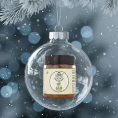 Deck the halls with jars of achaar. Our Aam Achaar is featured here as a Christmas ornament, because good taste is always in season.