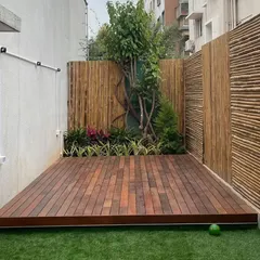 Another angle of the Brazilian Ipe wood deck, showing its rich color and clean finish. This durable hardwood is an excellent choice for creating a sophisticated and long-lasting outdoor platform.