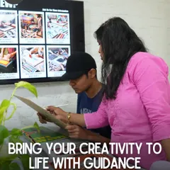 I believe in bringing your creativity to life with tailored guidance from experts. Here, an instructor is reviewing a student's work, providing personalized feedback.