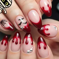 A spooky and fun Halloween design. This set features bloody drip tips, tiny skulls, bats, and spiderwebs for a look that is perfectly haunting.
