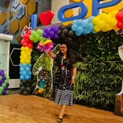 Performing a colorful illusion during a corporate family day at Opus Consulting Services. My shows are always family-friendly and fun for all ages.