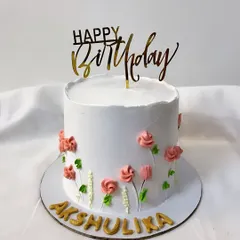 Pretty, pretty, pretty. This minimalist cake is decorated with delicate buttercream flowers piped directly onto the side, creating a simple yet beautiful design.