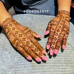 This geometric design was created for a client observing Maaskhaman Tapasya. The repeating pattern includes tiny, subtle elephant motifs, adding a unique touch to the traditional grid work.