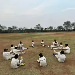 Cooling down after a tough session. Our players performing stretching exercises in a circle during our Hyderabad tour.