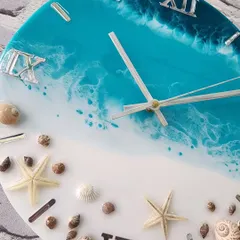 Bringing the beach to Chandigarh. This 12 inch ocean theme resin wall clock, complete with real seashells and starfish, is on its way to its new home.