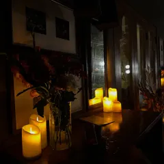 The right atmosphere is key to relaxation. I always set up my space with soft, warm lighting from candles to create a sanctuary where you feel safe enough to switch off and focus inward.