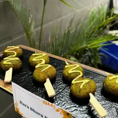 A vegetarian favourite with a modern twist. Our Hara Bhara Kababs are served as convenient lollipops, drizzled with a tangy mustard sauce, making them a perfect mess-free appetizer for any event.