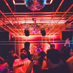 The view from the dance floor at Gawky Goose, looking up at the DJ console. The energy is always electric.