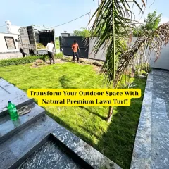 My team installing natural premium lawn turf at a residential property. You can see the fresh grass rolls being laid out to transform the outdoor space.