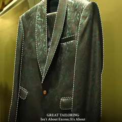 Great tailoring is not about excess, it is about precision. This image highlights the clean lines and sharp silhouette of a patterned formal suit, demonstrating how a perfect fit defines the garment.