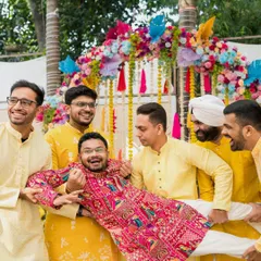 The groom's squad in action. The fun and mischief of a Haldi ceremony are just as important to the story as the romance.