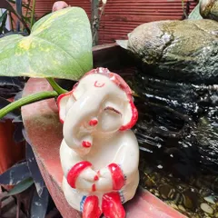 My little cute Ganesha sitting peacefully by the water feature in my studio. He always inspires me while I work.