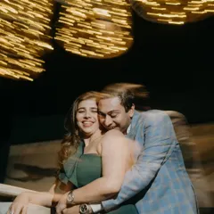A creative use of motion blur and warm lights to create a dynamic and celebratory feel. This shot is full of energy and captures the whirlwind of excitement in a unique, artistic way.