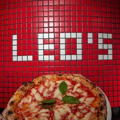 The OG, the classic, the one and only Margherita, posing right where it belongs. Simple ingredients, done right, fresh from our wood-fired oven. This is the pizza that started it all.