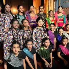 Our junior students dressed in colorful costumes for their Kathak and Contemporary dance performances. We encourage them to explore different styles from a young age.