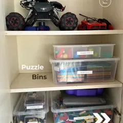 We are experts in organizing kids' rooms. This shows how we use labeled puzzle bins to keep smaller toys contained and easy to find.