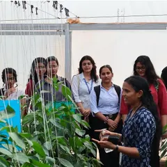 A trainer from our team explains the principles of protected cultivation to students from SCMS Bengaluru. Our educational visits are interactive, offering deep insights into modern and sustainable horticulture.