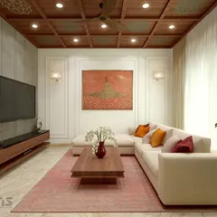 This living room for Mr. Aniketh's residence showcases our Indian Bohemian style. We combined a coffered wooden ceiling, a plush sectional sofa, and earthy tones to create a warm, comfortable, and culturally rich environment.