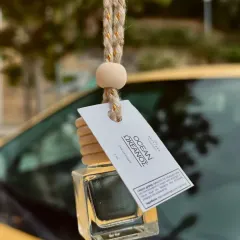 I offer a variety of scents for my car fresheners. This close-up shows the 'Ocean' fragrance tag, giving you a glimpse of the different aromatic experiences available for your vehicle.