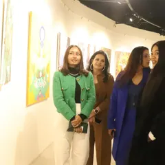 Here I am at the Lokayata Art Gallery, surrounded by my work and fellow art lovers. The energy and conversations at these events are what fuel my passion to create more.