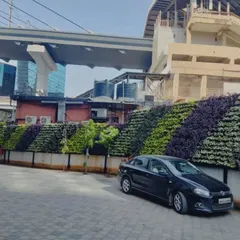 Another perspective of our large-scale urban green wall next to a metro overpass. These installations are designed to thrive in urban environments, helping to reduce noise, improve air quality, and beautify public infrastructure.