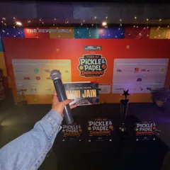 I've got my mic, so I'm in my element. This shot from the TSRS Pickle & Padel Showdown captures the essence of what I do: bringing people together for a memorable event.