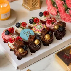 A closer look at the Rakhi mini cupcakes, showing the detailed toppings and vibrant colors. Each cupcake is a little burst of flavor and joy.