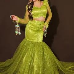 This shot highlights the unique floral kaleeras, a modern twist on the traditional accessory. These are lightweight and add a beautiful pop of color to your Haldi or Mehendi outfit.
