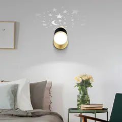 This unique wall light projects a pattern of stars and a moon onto the wall, making it a magical addition to a bedroom. The main light is also rotatable, so you can use it as a focused reading light.