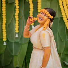 The pure, unadulterated fun of a Haldi ceremony. I love capturing the laughter and vibrant colors of this tradition, showing the bride enjoying the moment with her loved ones.