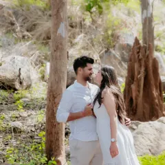 A walk in the woods becomes a romantic escape. I love using the soft, natural light filtering through the trees to create serene and intimate couple portraits.