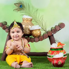 This little Kanha is all smiles with his flute and pots of butter. The vibrant colors and happy expression make this a favorite.