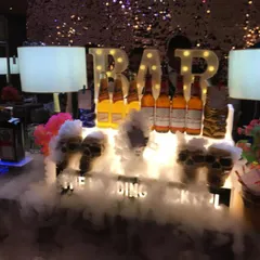 Our bar setup featuring skull-shaped glasses overflowing with theatrical smoke, creating a spooky and fun vibe for a themed party.