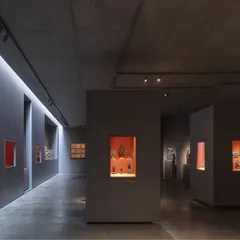 The experience of art is shaped by its environment. In the Vismaya private museum, we manipulated form and light to create dramatic, atmospheric galleries, using focused illumination and dark, monolithic partitions to highlight individual artifacts and guide the visitor's journey.