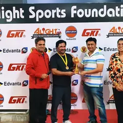Presenting a trophy to a winner at our corporate open tournament. These events bring together talent from over 80 different companies.