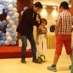 I love getting the kids involved in fun games and activities. Here I am hosting a game during a birthday party.