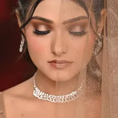 A close-up of a spotlight eye look, where the center of the lid is highlighted to create a bright, eye-opening effect. This is perfect for beauty editorials and campaigns where the makeup is the star.