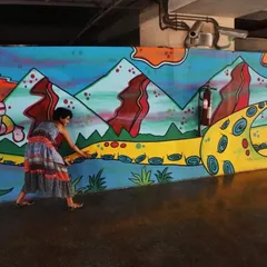 And just like that, my mural made way for a fast-food ad. This is the bittersweet reality of public art. This piece, featuring an astronaut and a surreal landscape, had a short but vibrant life at the WEH metro station.