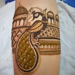 This is a full arm band design featuring a royal peacock against an architectural backdrop. The combination of fine lines and bold shading makes the design stand out.