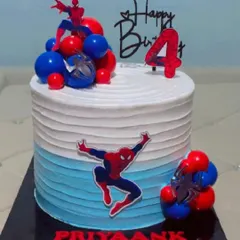 This is another view of the popular Spiderman-themed cake, showing the clean lines and vibrant colours. I can customize any superhero cake with names and ages to make your child's birthday extra special.