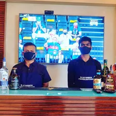 A typical house party setup where guests can enjoy the event, like watching a match, while we handle the drinks. Our vaccinated team prioritizes safety, cleanliness, and hygiene for your peace of mind.