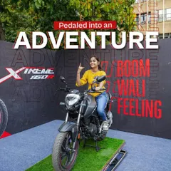 A student poses on a Hero Xtreme 160R at one of our campus photo booths. These displays allowed students to get up close with the bikes and created great photo opportunities.