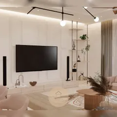 A serene and elegant living room with a custom TV unit and minimalist shelving. The neutral color palette, clean lines, and modern lighting create a calming sanctuary perfect for unwinding.