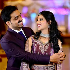 Capturing the unscripted smiles between a couple is what I love most. This candid moment from a wedding reception shows the pure happiness and connection that makes for a timeless memory.