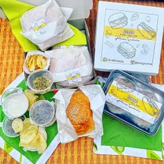 Enjoy a gourmet burger night at home with my DIY meal kits. I pack everything you need: your choice of handcrafted patties, soft buns, cheese, caramelised onions, mushrooms, special mayo, and even chips for the side.